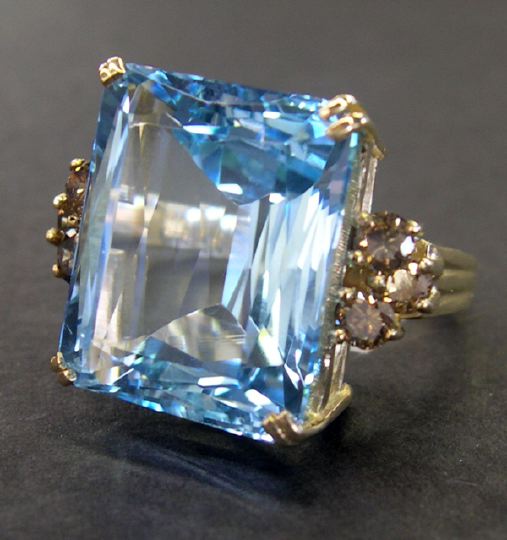 Appraisal: Fourteen-Karat Yellow Gold and Large Blue Topaz and Cognac Diamond