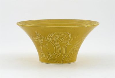 Appraisal: A Susie Cooper studio pottery yellow bowl carved with a