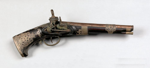 Appraisal: European flintlock pistol with silver applique decoration the barrel impressed