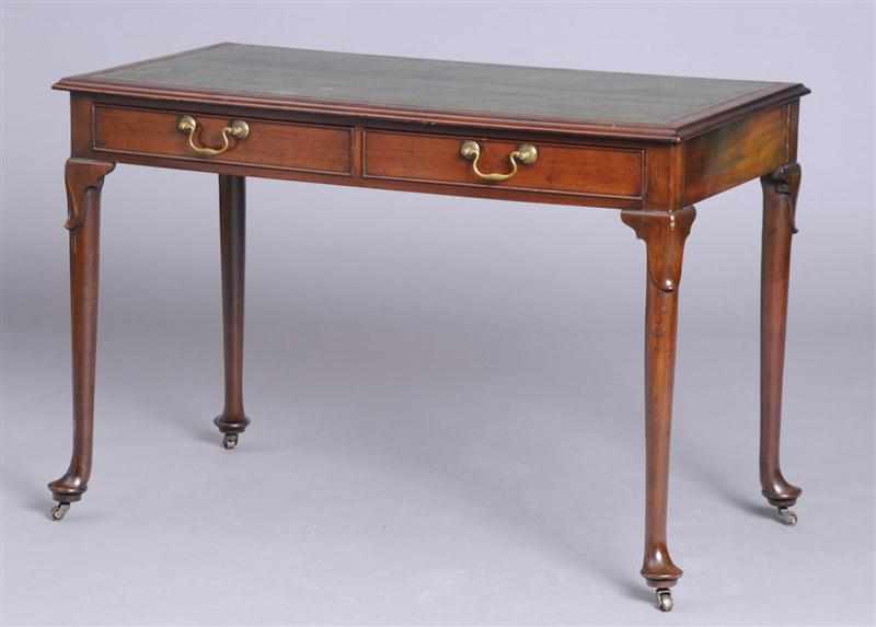 Appraisal: GEORGE III MAHOGANY WRITING TABLE The gold-tooled green leather paneled