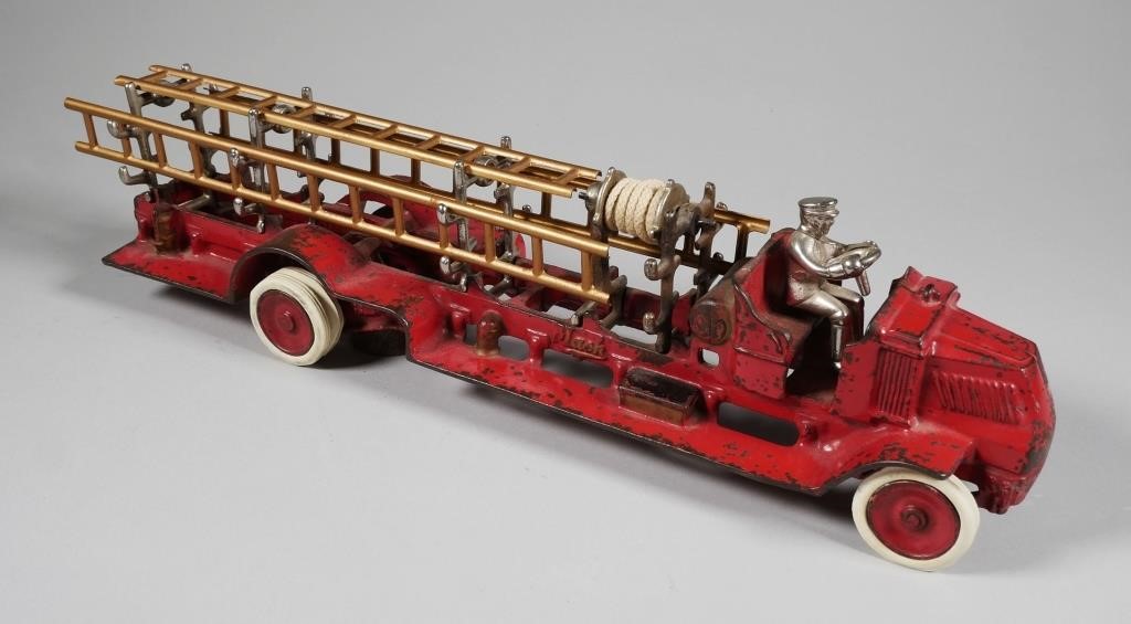 Appraisal: Arcade Mack fire ladder truck approx in length Toy truck