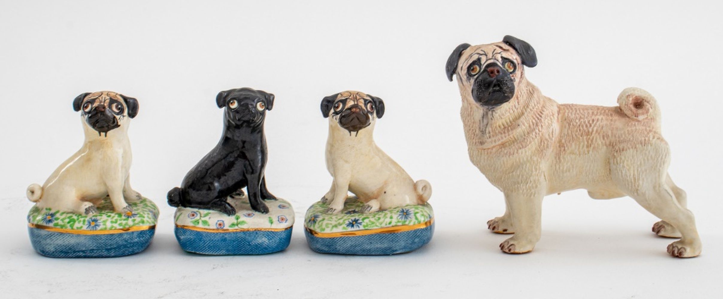 Appraisal: BASIL MATTHEWS BRITISH PUG DOG FIGURINES Group of four vintage