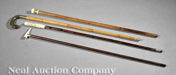 Appraisal: Four English Gadget Canes th c including a bamboo shaft