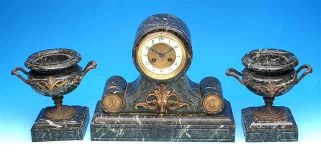 Appraisal: A th Century French black veined marble clock garniture de