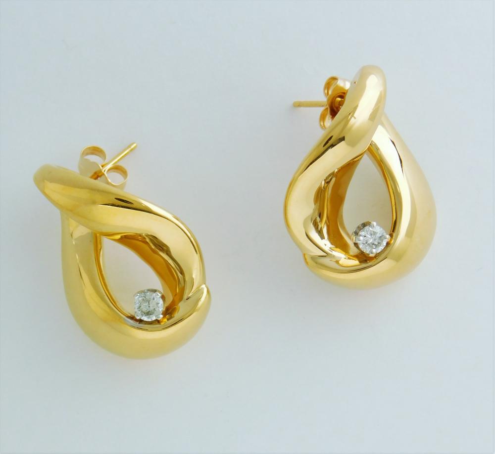 Appraisal: PAIR OF DIAMOND AND FOURTEEN KARAT GOLD EARRINGS each k