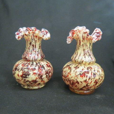 Appraisal: Pair of Victorian Art Glass Vases red white mottled design