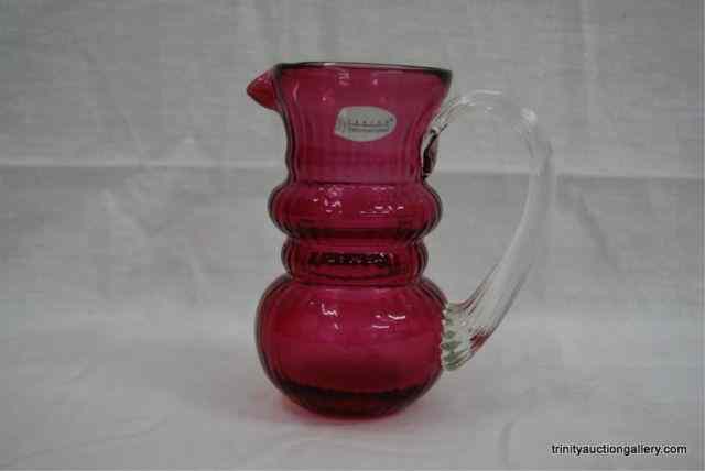 Appraisal: Fenton Glass Cranberry '' Cream Pitcher With a clear applied