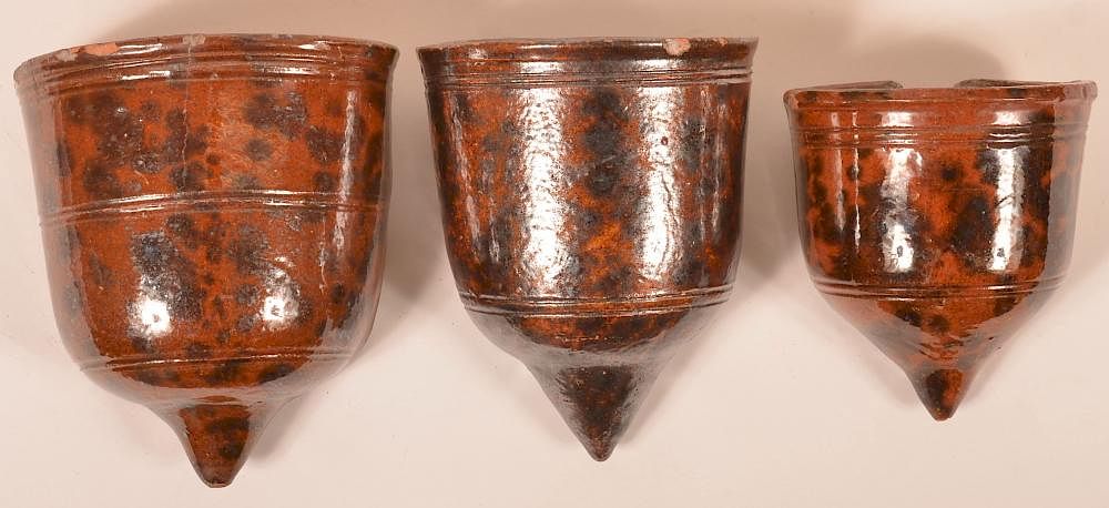 Appraisal: PA th Cent Mottled Redware Wall Pockets Three Pennsylvania th