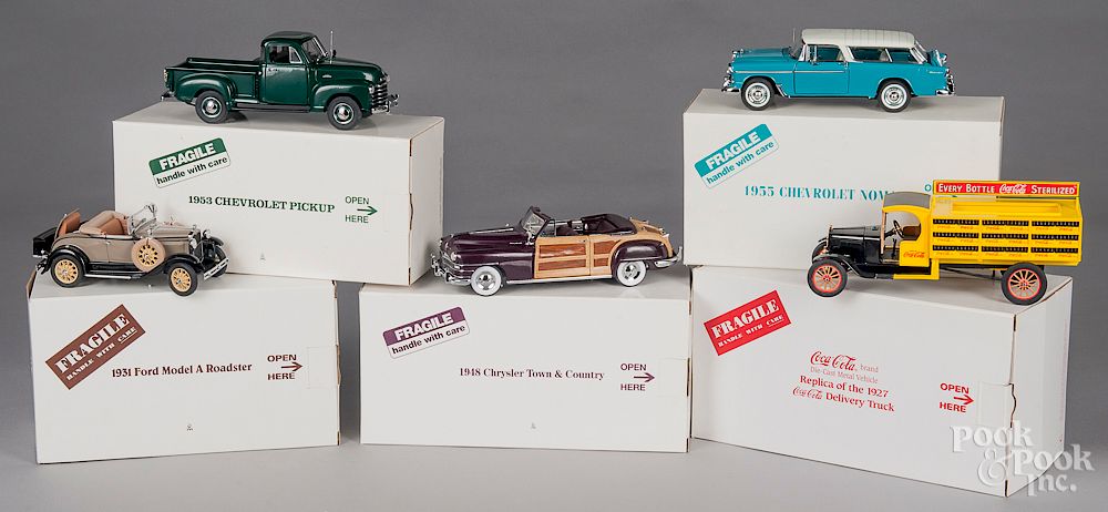 Appraisal: Five Danbury Mint vehicles Five Danbury Mint vehicles in their