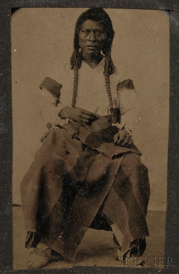 Appraisal: Tintype of a Seated Warrior wearing a cloth shirt and