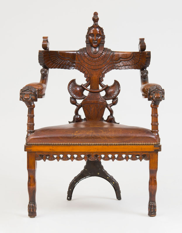 Appraisal: EGYPTIAN REVIVAL ARMCHAIR C Carved birch leather x x in