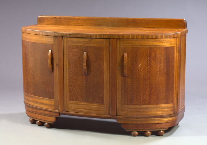 Appraisal: Art Deco Oak Buffet of bowfront with a solid splash