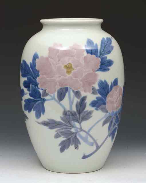 Appraisal: A JAPANESE WHITE GROUND PORCELAIN TAPERING VASE with underglaze blue