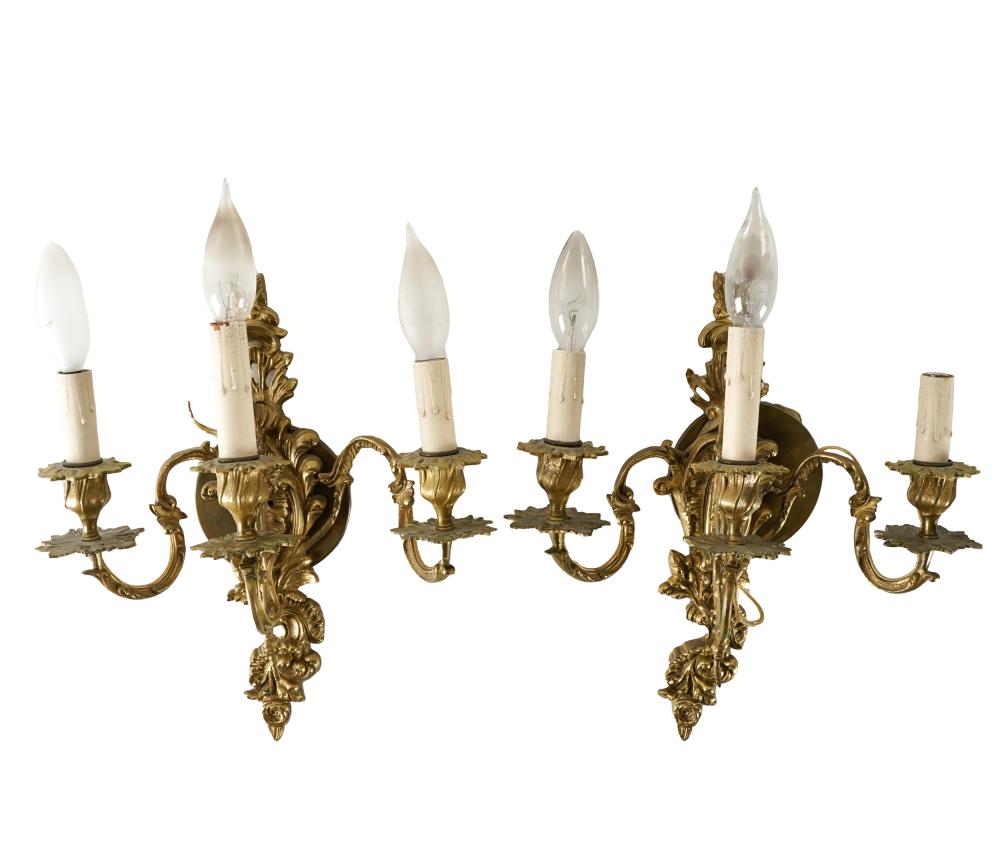 Appraisal: PAIR OF ROCOCO STYLE THREE-LIGHT SCONCESgilt brass Provenance Estate from