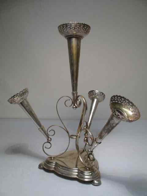 Appraisal: Victorian silver plated floral epergne Reticulated rims Removable flutes Engraved