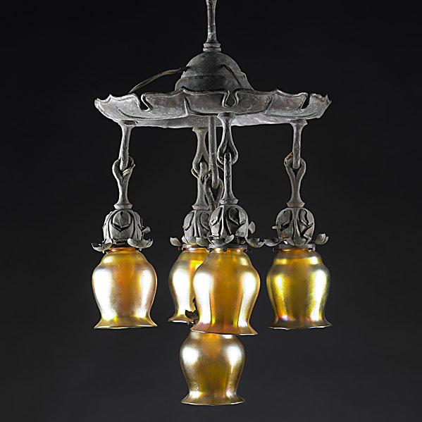 Appraisal: QUEZALCopper chandelier with art glass shadesShades signed QuezalTotal x shades