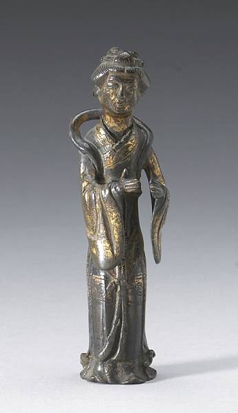 Appraisal: A gilt bronze figure of a female attendant Ming Dynasty