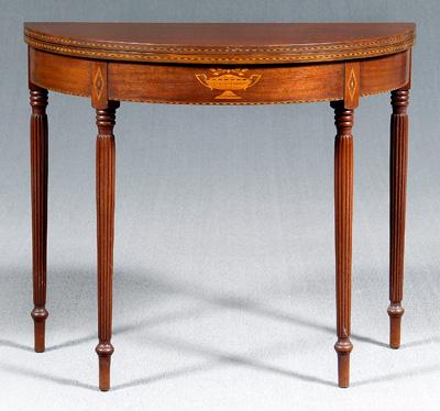 Appraisal: Federal style inlaid games table mahogany fold-over top urn inlaid