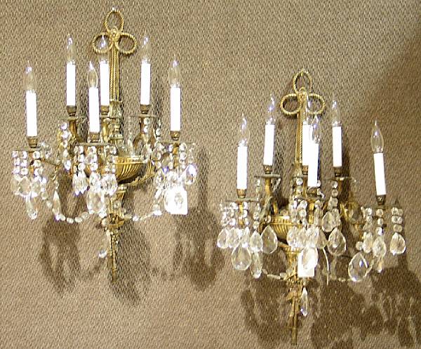 Appraisal: A pair of Neoclassical style brass and glass six light