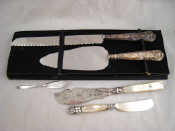 Appraisal: Three silver butter knives One with m o p handle