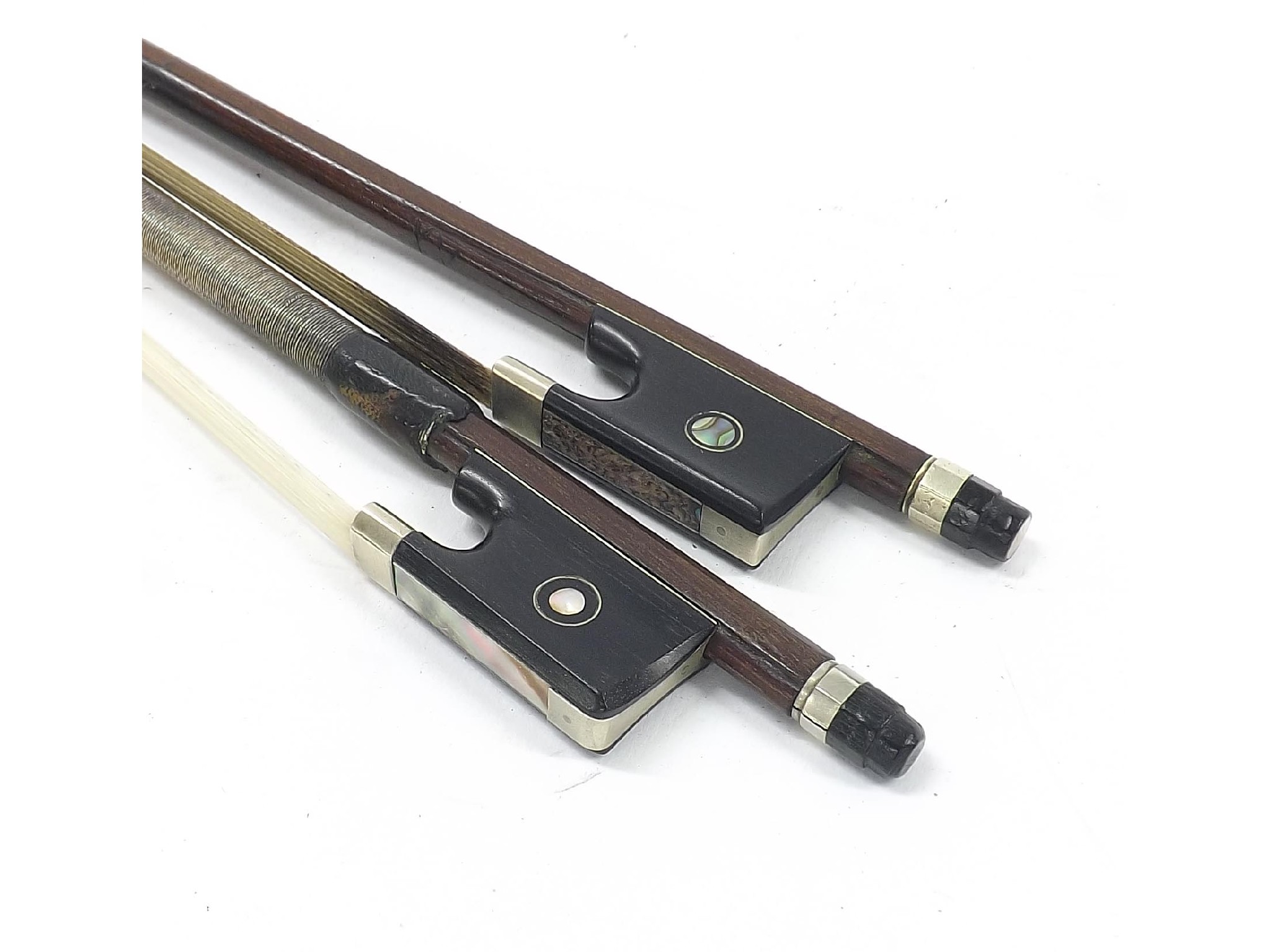 Appraisal: Two nickel mounted violin bows unstamped