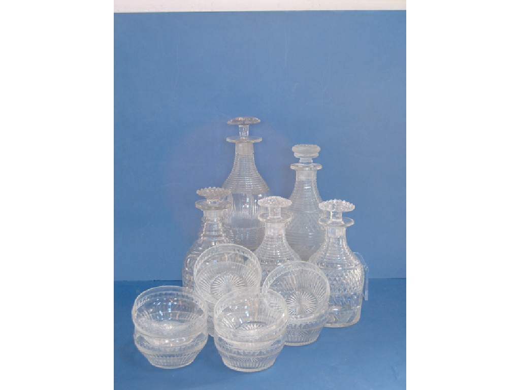 Appraisal: A PAIR OF REGENCY STYLE CUT-GLASS DECANTERS with cut stoppers