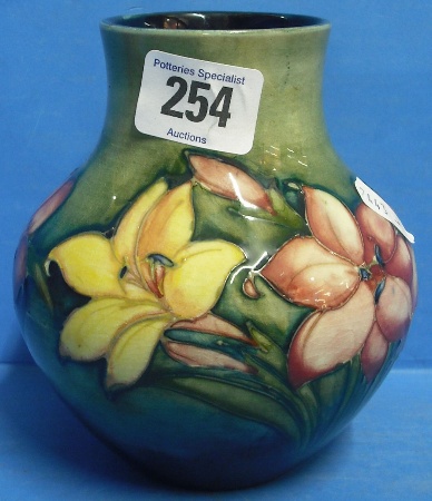 Appraisal: Early Moorcroft African Lilly Vase on Green Ground