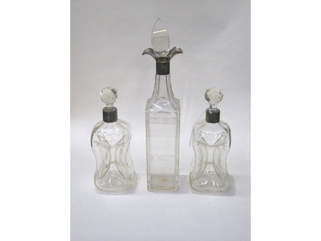 Appraisal: Lot comprising a pair of silver mounted decanters Birmingham and