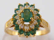 Appraisal: A French hallmarked carat gold emerald and diamond ring the