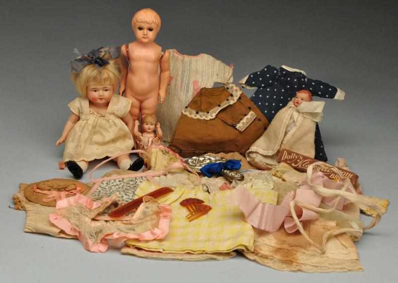 Appraisal: Lot of Celluloid Dolls Description Unmarked German doll with molded