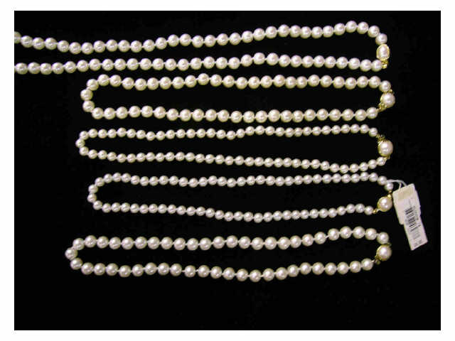 Appraisal: Five faux pearl Carolee necklaces with gold tone and pearl