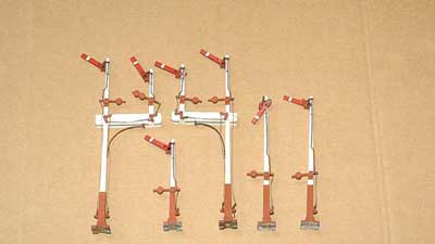 Appraisal: Bassett-Lowke wooden O Gauge Signals consisting of Junction Signals x