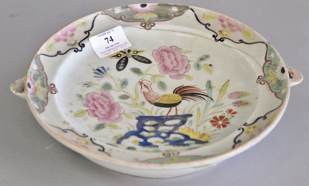 Appraisal: Famille rose warming plate hand painted enameled flowers and butterflies