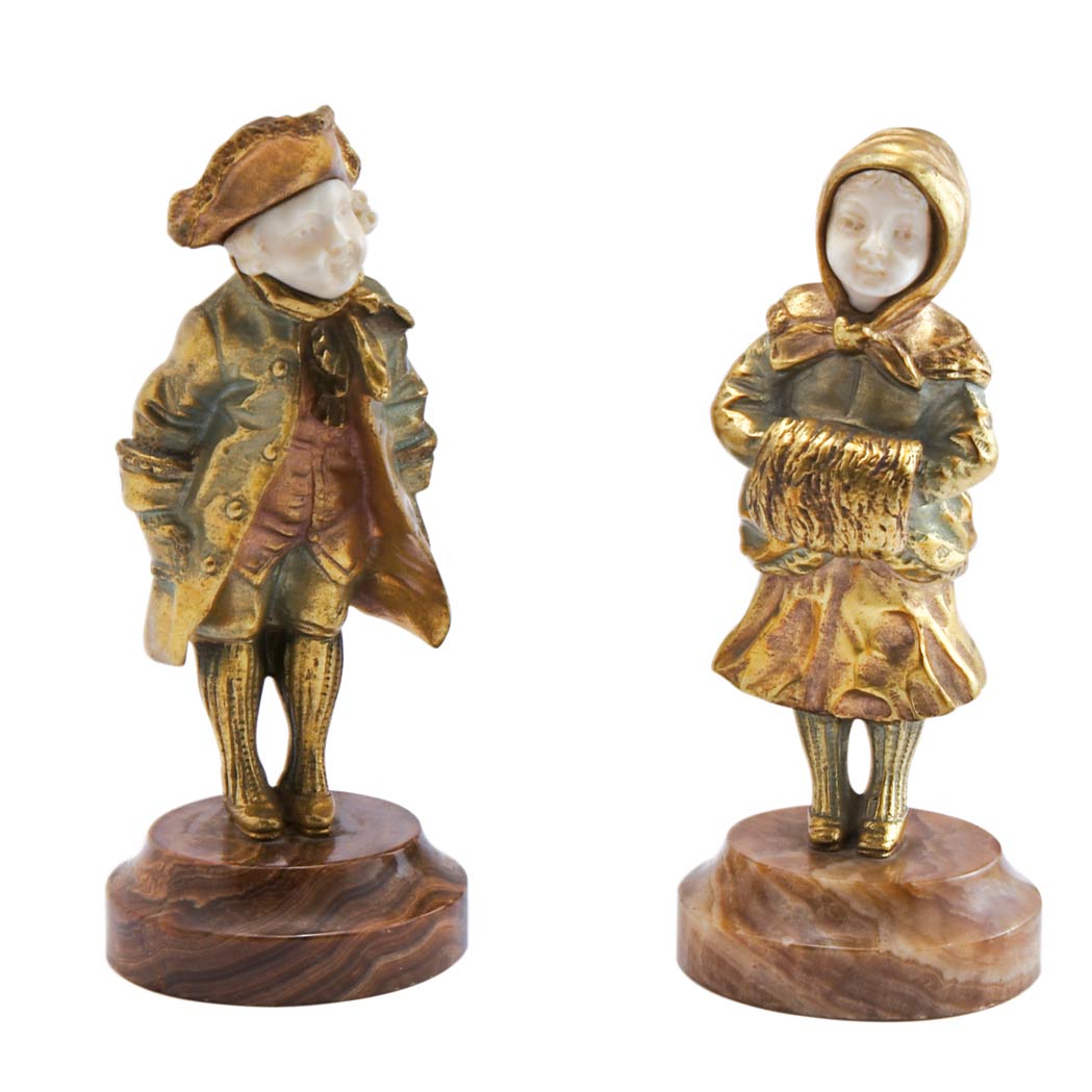 Appraisal: Pair of French Gilt-Bronze and Carved Ivory Figures of a