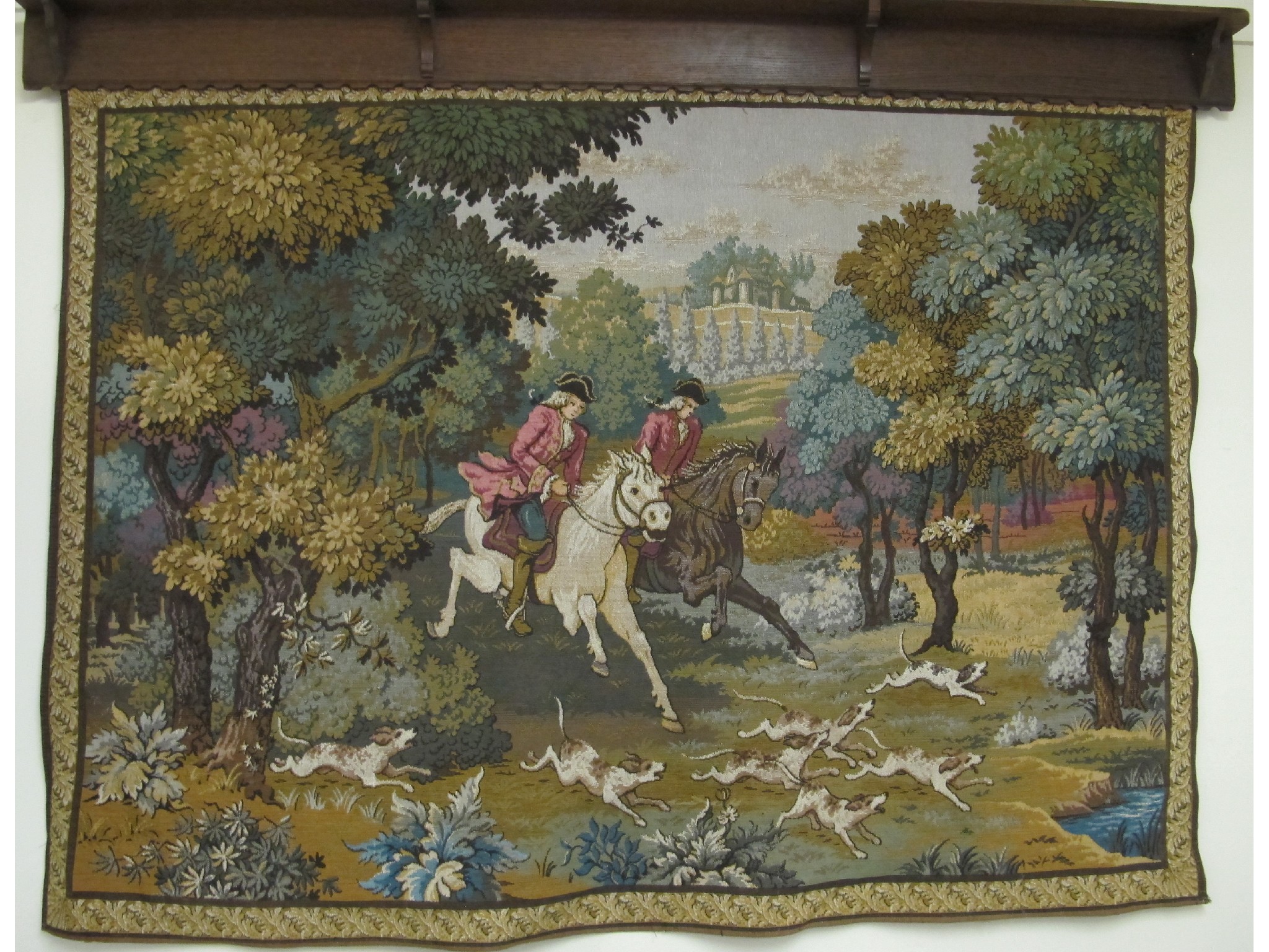 Appraisal: A large wall hanging tapestry depicting a hunting scene and