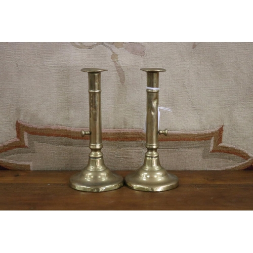 Appraisal: Pair of antique English brass ejector candlesticks each approx cm