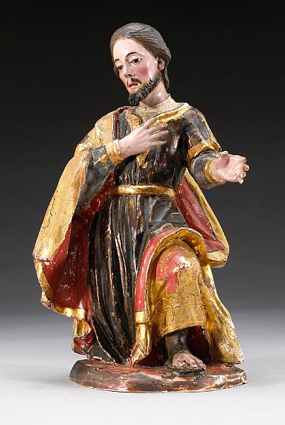 Appraisal: A Spanish colonial polychrome and parcel giltwood figure of St