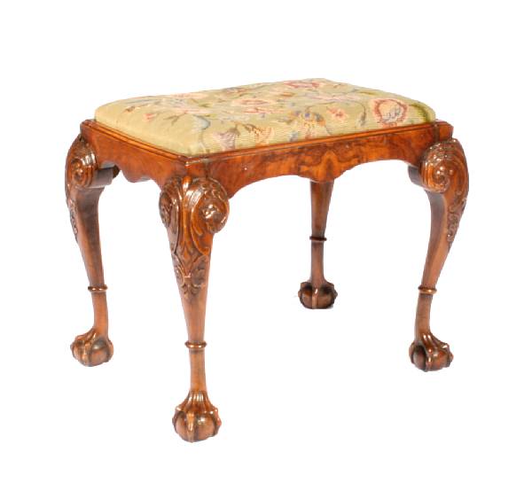 Appraisal: An English Chippendale style needlepoint upholstered bench height in width