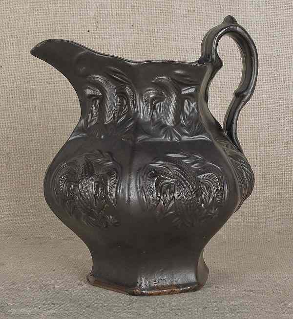 Appraisal: Molded stoneware pitcher ca probably Woodbridge or Jersey City New