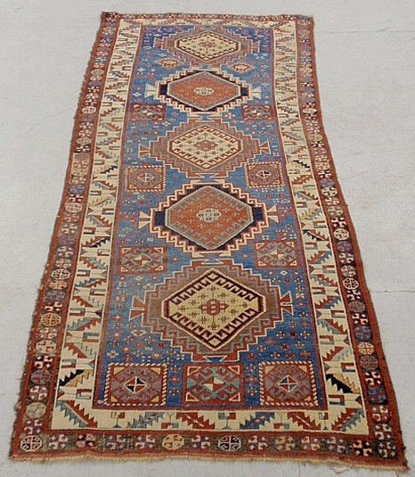 Appraisal: - Colorful Kazak oriental hall runner with a blue field