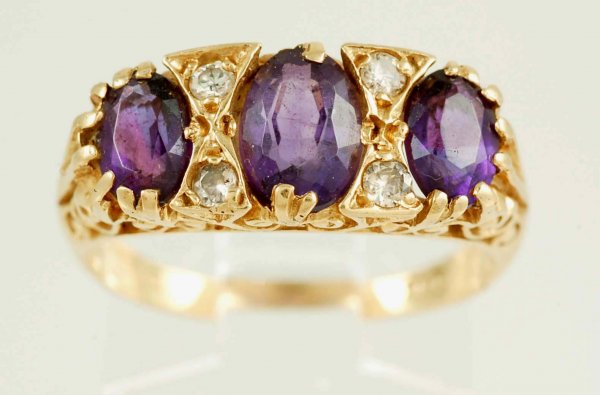 Appraisal: Amethyst and diamond ring in approximately K yellow gold Three