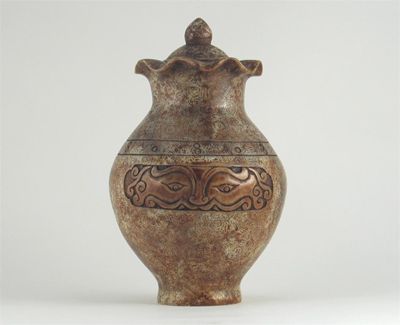 Appraisal: A Chinese soapstone vase and cover carved with panels of