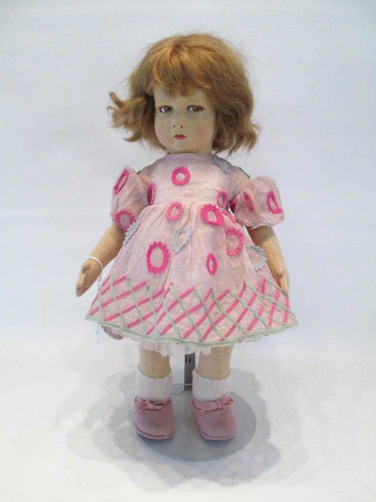 Appraisal: LENCI FELT CHARACTER DOLL with swivel head painted face layered