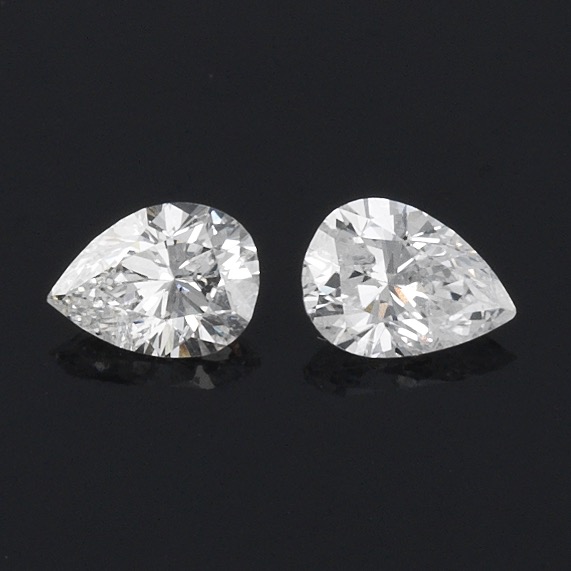 Appraisal: UNMOUNTED PAIR OF PEAR CUT DIAMONDS Total weight carats