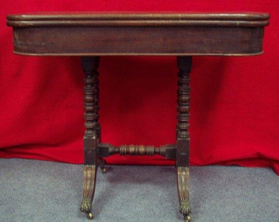 Appraisal: A Regency mahogany tea table the fold over top above