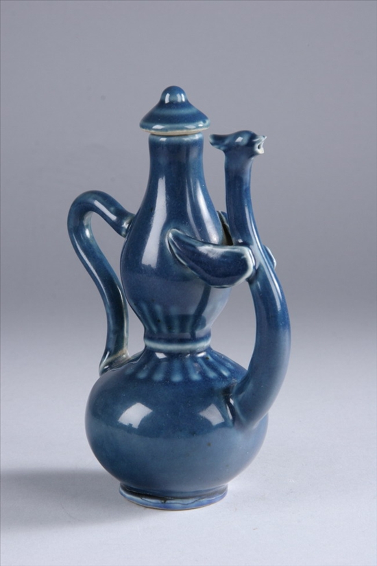 Appraisal: CHINESE MONOCHROME BLUE PORCELAIN DOUBLE GOURD EWER AND COVER Qianlong