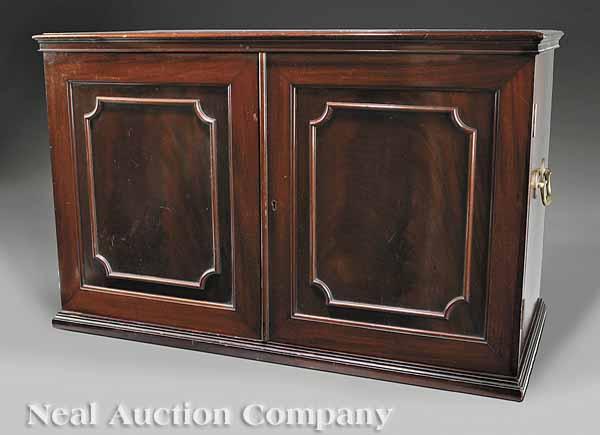 Appraisal: An Edwardian Mahogany Table Top Collector's Cabinet with celluloid label