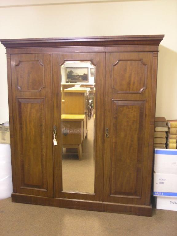 Appraisal: A Victorian mahogany wardrobe pair of full length panelled doors