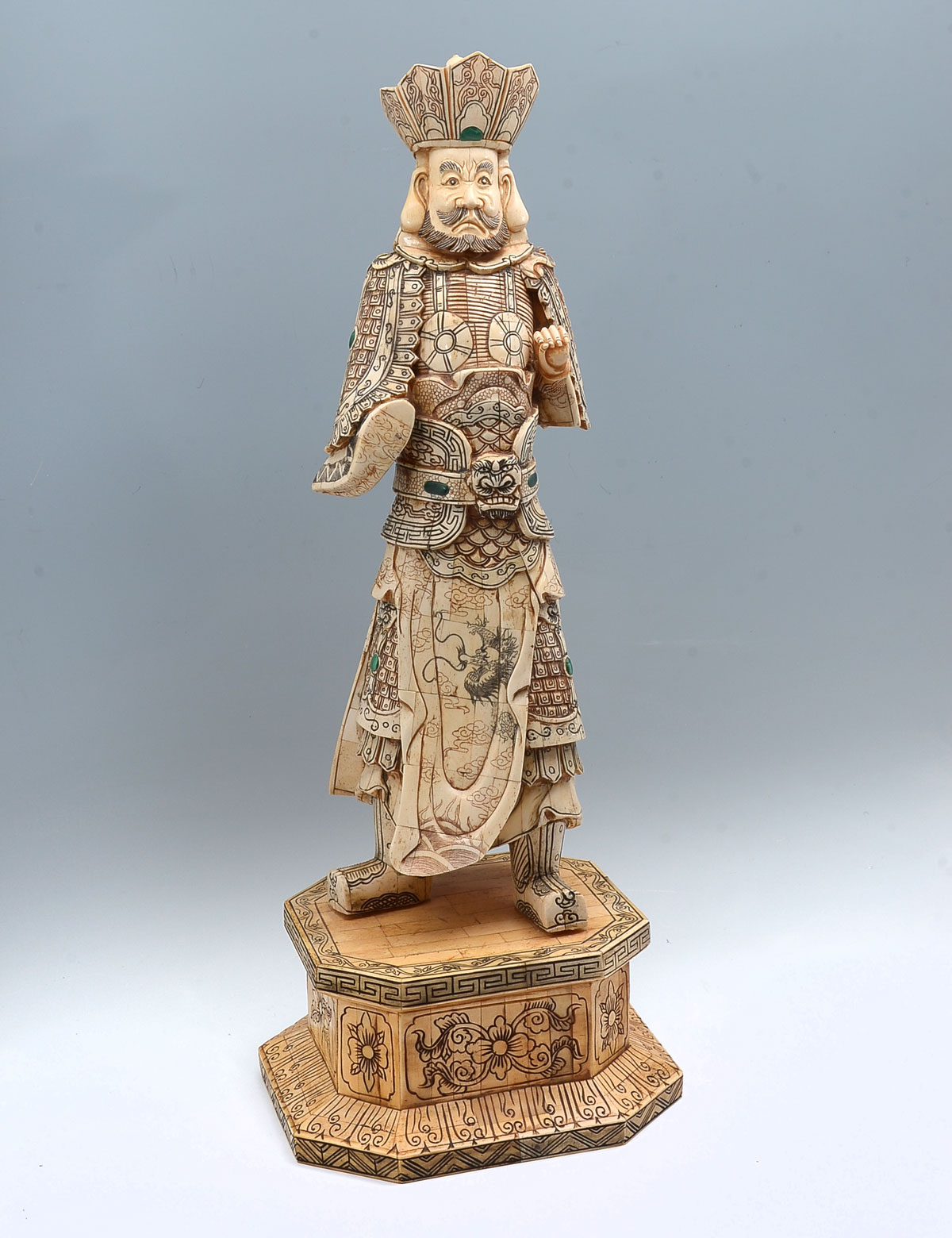 Appraisal: TALL CHINESE BONE CLAD WARRIOR Figure of a warrior holding