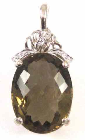 Appraisal: LEMON QUARTZ AND DIAMOND PENDANT k white gold with round-cut